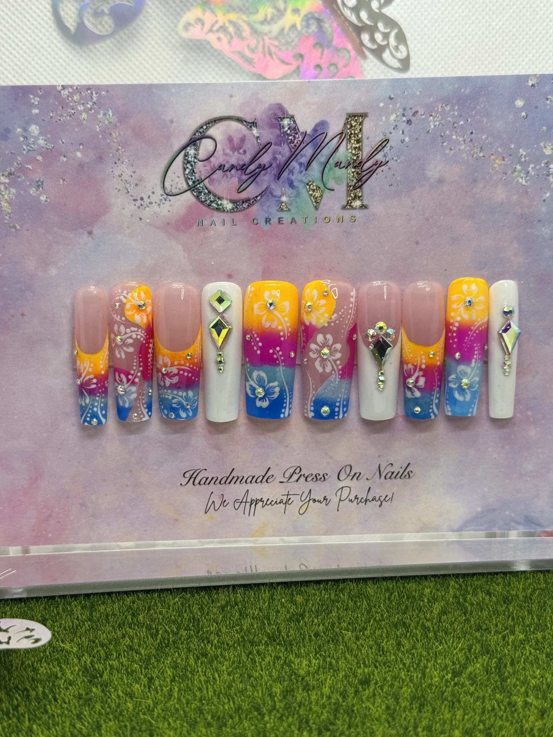 Colorful Ombre w_ Hibiscus & Rhinestones Press-On Nail Set – Medium_Long Press On Set #45 Price 25.00 Colorful Ombre w/ Hibiscus & Rhinestones Press-On Nail Set – Medium/Long Press On Set